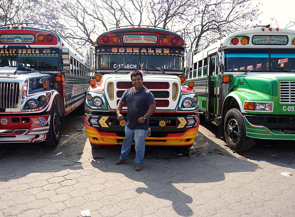 File:Chickenbus and driver in Antigua, Guatemala.jpg